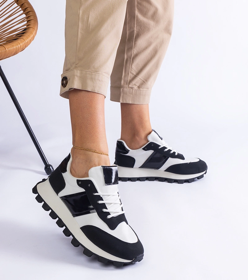 Czarne sneakersy z widocznym protektorem Restia