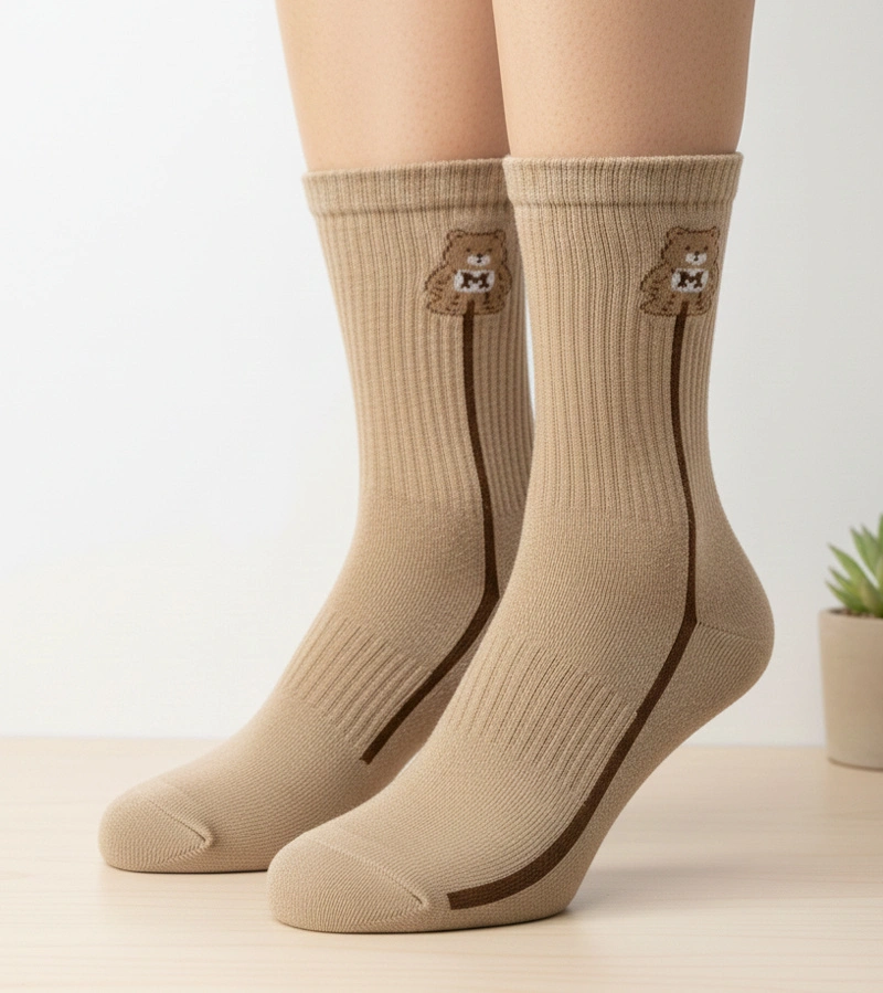 Beżowe ciepłe skarpetki z misiem Sella