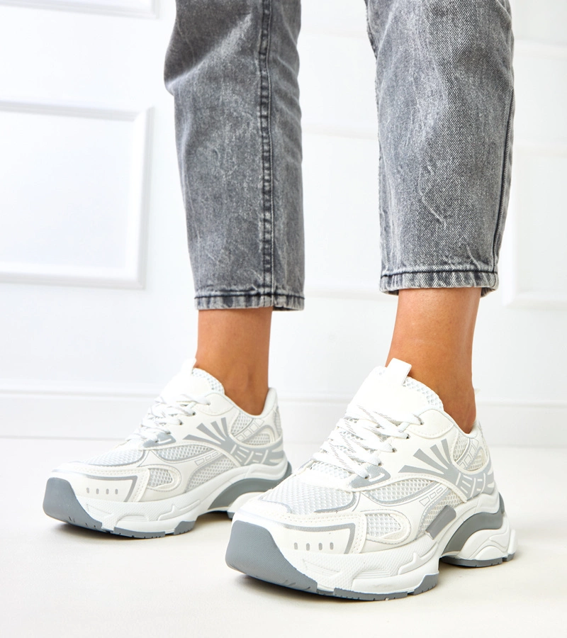 Białe sneakersy sportowe na masywnej podeszwie Tims