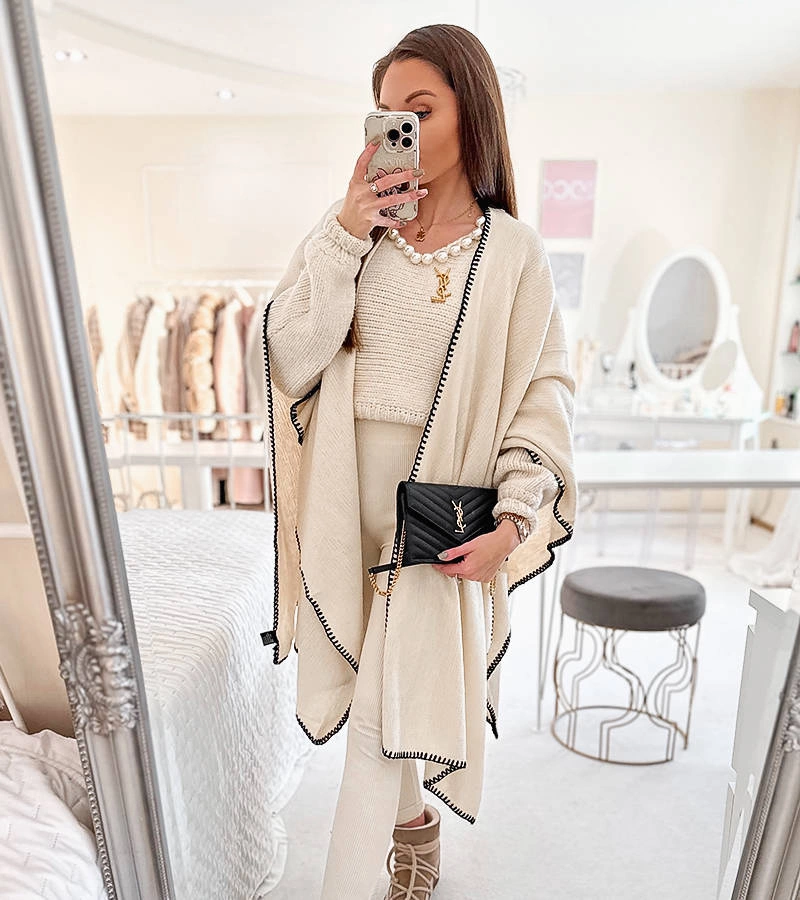 Beżowe ponczo z obszyciem Levi